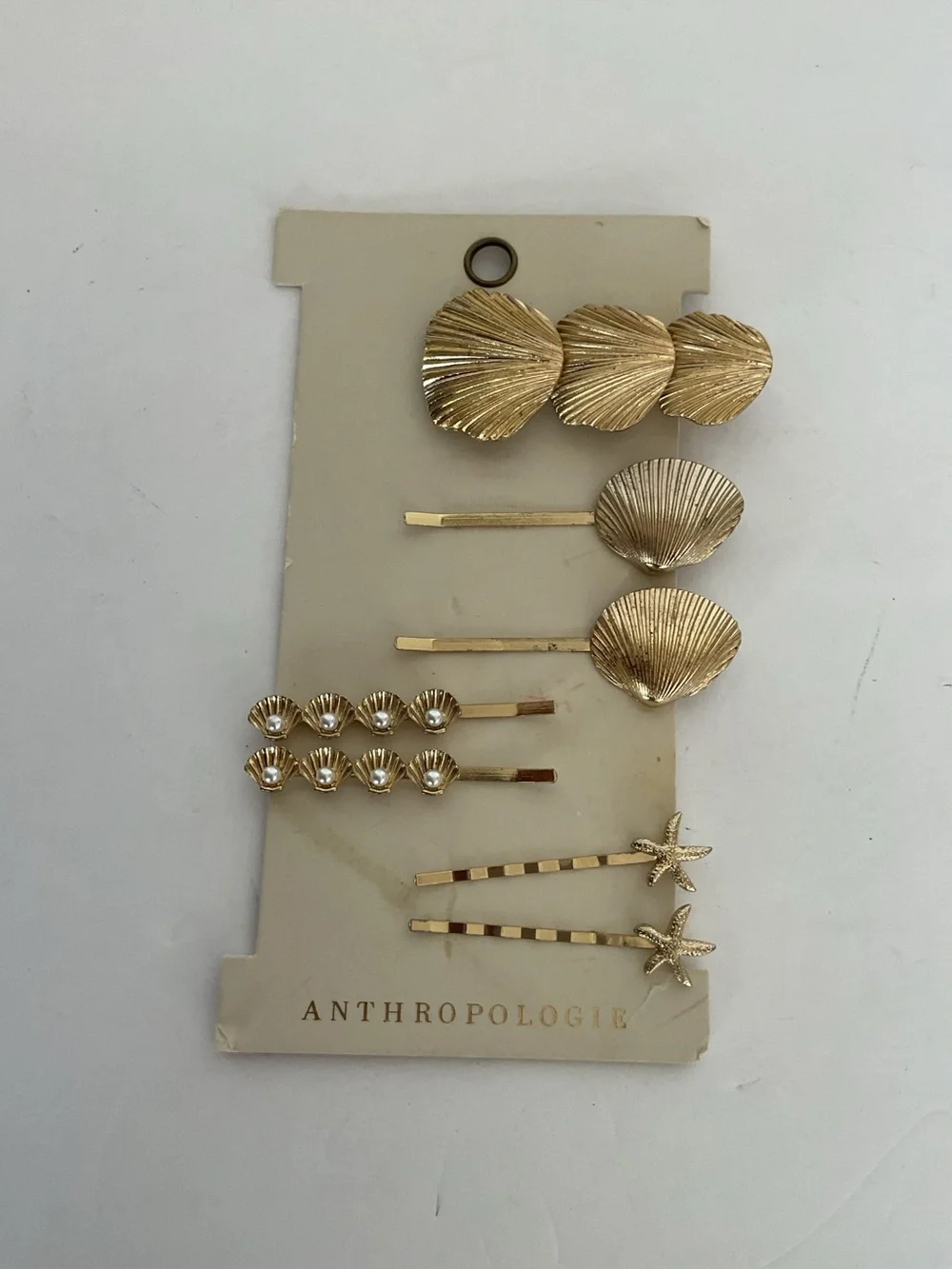 Anthropologie Gold she’ll hair clips NWT